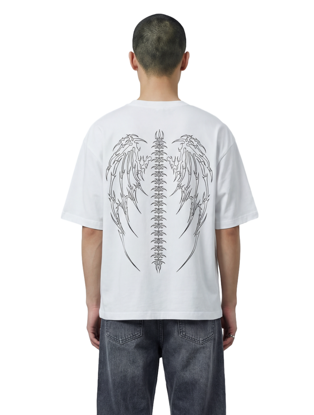 Person wearing a white t-shirt with a black design on the back, standing against a white background